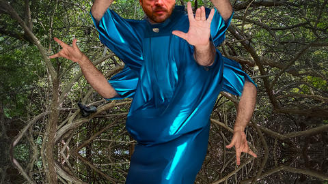 perosn with multiple arms imitating a starfish